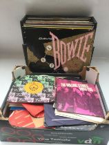 A record case of 12inch singles and a box of 7inch