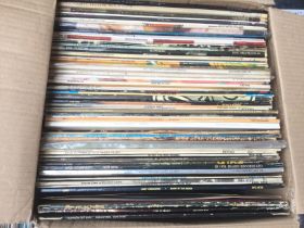 A box of mainly 1970s rock LPs by various artists