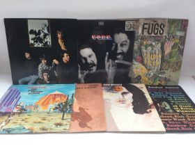 A collection in two bags of 20 rock and blues LPs