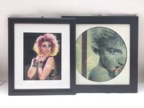 A framed and glazed signed photo of Madonna, appro