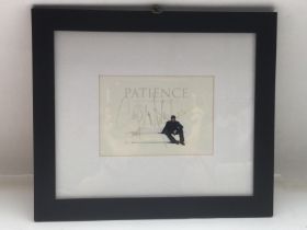 A framed and glazed signed photo of George Michael