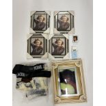 A selection of pop related framed photos, mirrors