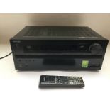 An Onkyo TNXR609 AV Receiver. Comes with remote co