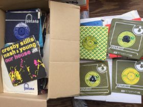 A box of 7inch singles by various artists includin
