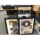 A collection of Elvis Presley pictures and wall mi