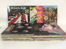 A collection of LPs by various artists including T