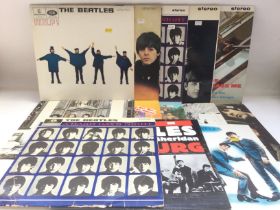 Thirteen LPs by The Beatles comprising an early UK