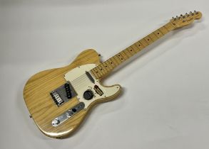 A 2010 USA Fender Telecaster in natural finish wit