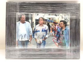 A framed and glazed photo signed by Top Gear prese