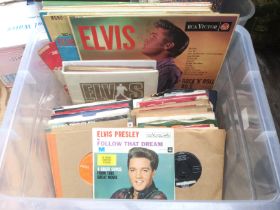 A collection of Elvis Presley LPs, 7inch singles a