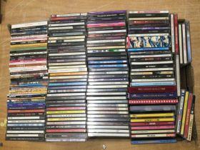 Four boxes of rock and pop CDs by various artists