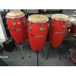 Three Latin Percussion conga drums, two with cases