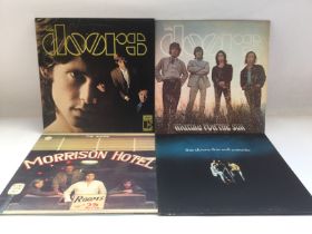 Four LPs by The Doors comprising the self titled d