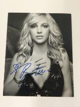 A signed photo of Britney Spears, approx 20cm x 25