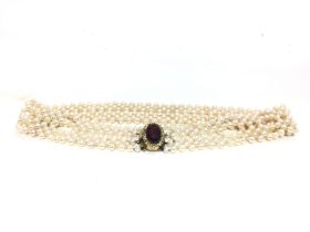 A Garnet clasp pearl necklace , postage category A