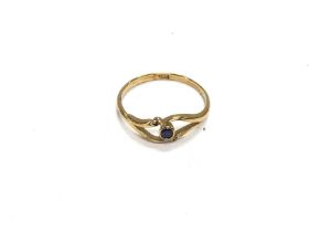 An 18ct gold ring set with a sapphire. 2.05g and s