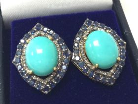 A pair of vintage- styled gilt stud earrings set w