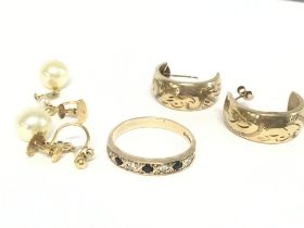 A 9ct gold sapphire and diamond chip diamond ring