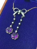 Vintage style bow top necklaces set with amethysts