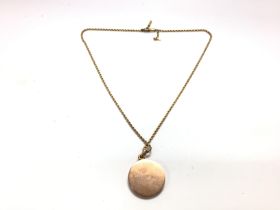 A 10ct gold Edwardian locket. Approximately 42cm l