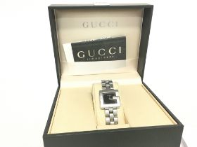 A boxed Gucci G Watch, postage category B