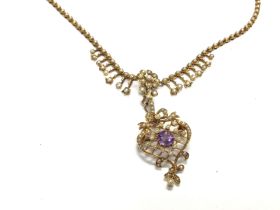 A 15ct Edwardian amethyst and seed pearl pendant s