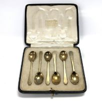 A cased set of 6 hallmarked silver gilt spoons wit