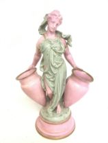 A Minton style porcelain figure of a woman with a
