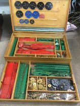 A collection of circa 1950s Meccano in two trays. Shipping category D.