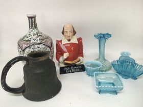 A collection of glass and ceramics comprising a si