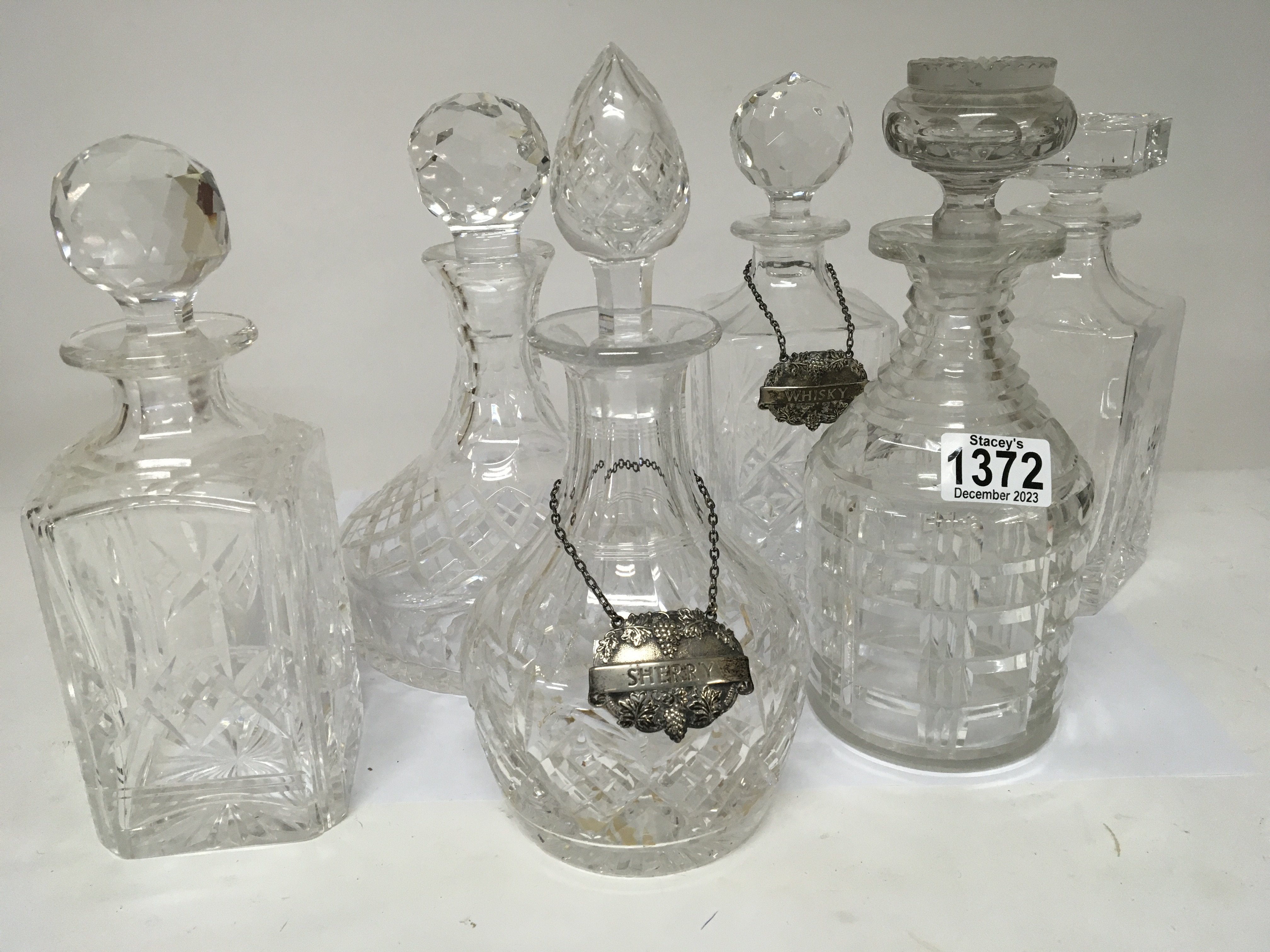 A collection of six cut glass decanters (6)