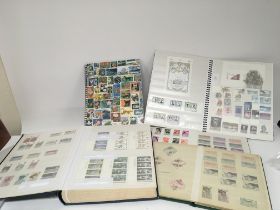 A collection of stamp albums world stamps both use