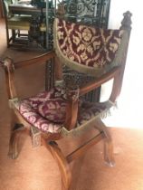 An Italian walnut 19th century open arm chair the