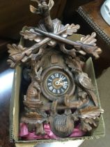 A 20th century carved wood Black Forest cuckoo clock.