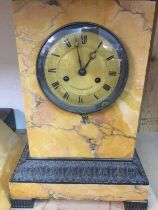 A Recency marble mantle clock with bronze mounts the circular dial with Roman numerals pendulum no