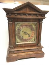 Walnut mantle clock, dimensions approximately 19x4