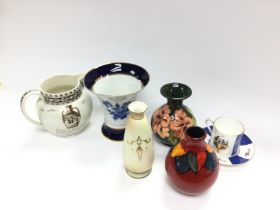 A collection of vases including Moorcroft, Poole a