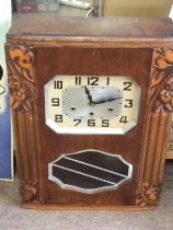 A Westminster Bidan Vaudry Vire deco clock, postag