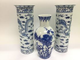 Three blue and white Oriental vases comprising a p