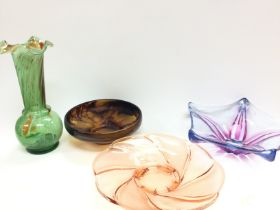 A collection of coloured art glass dishes and a va