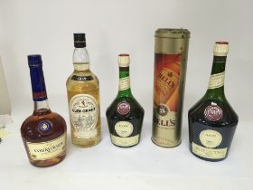 A bottle of Glen Grant Pure Malt Whisky 1Litre a bottle of Courvoisier brandy bottles of Benedictine