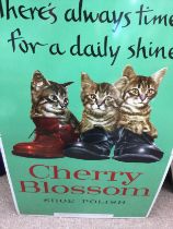 A cherry Blossom sign depicting three cats .45 cm