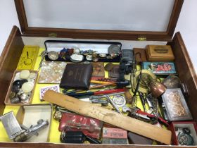 A collection of assorted vintage items including b