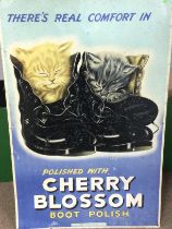 A vintage Cherry Blossom Boot Polish advertising t