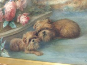 A gilt framed watercolour depicting dogs amongst f