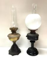 2 Victorian oil lamps, 1 cast iron and brass, 1 sh