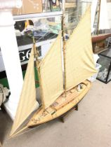 A three mast model boat 115cm tall, 105cm long. Postage category D