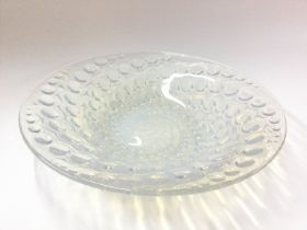 A Lalique opalescent bowl, moulded with swirling b