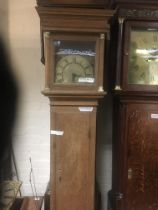 An oak cased long case clock with brass dial and R