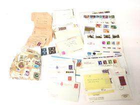 A collection of various stamps and certificates of